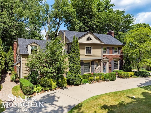 28 Hampton Rd, Grosse Pointe Shores, MI 48236 - view of front of property with a chimney and roof with shingles