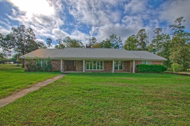 ranch-style house with a front yard