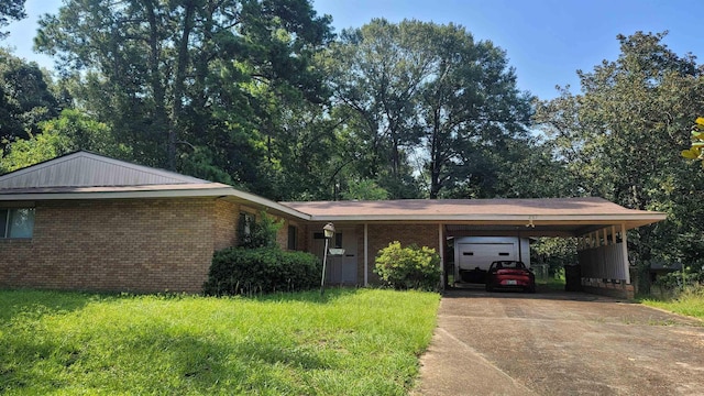 ranch-style house featuring a carport