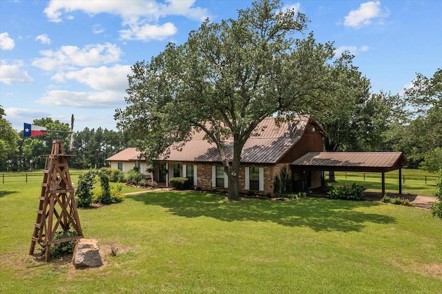 463 Allen Dr, Pollok, TX 75969 - view of front of property featuring a carport, a metal roof, and view of scattered trees