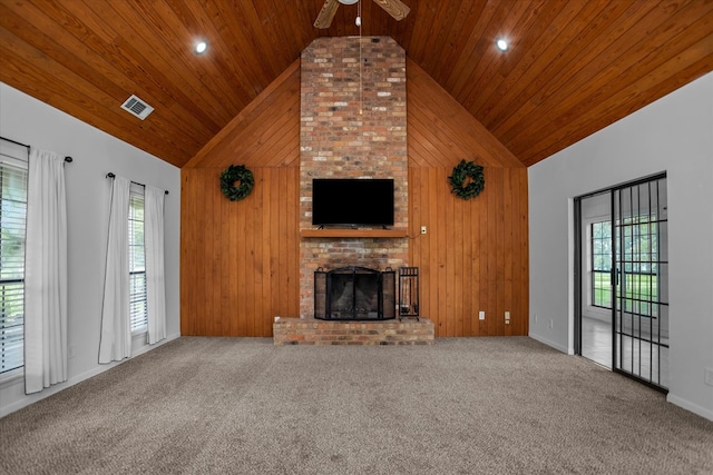 463 Allen Dr, Pollok, TX 75969 - unfurnished living room with high vaulted ceiling, a ceiling fan, wood ceiling, a brick fireplace, and carpet
