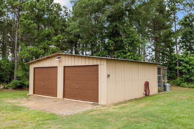 463 Allen Dr, Pollok, TX 75969 - detached garage featuring view of wooded area