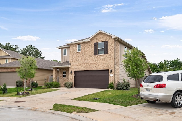 traditional-style home featuring concrete driveway, brick siding, a front lawn, and a garage
