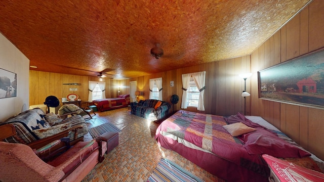 bedroom featuring wood walls