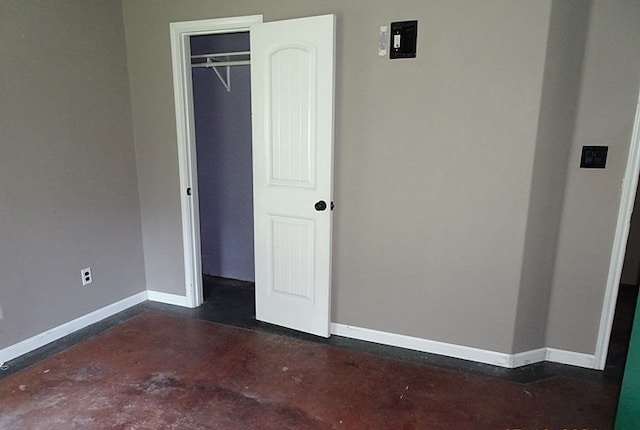 unfurnished bedroom with a closet