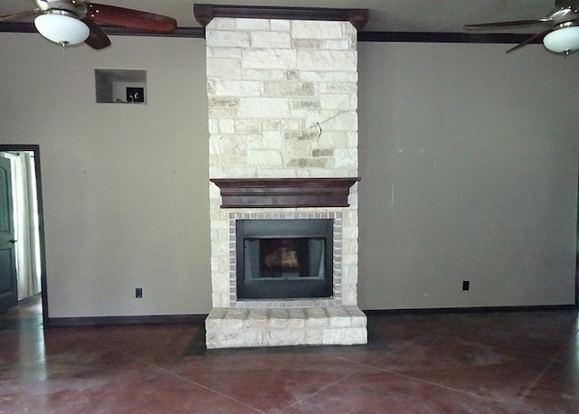 unfurnished living room featuring a fireplace, ceiling fan, and ornamental molding