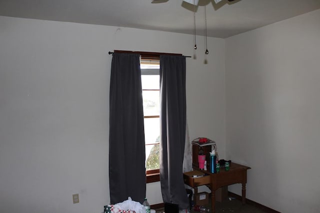 office with a ceiling fan and a wealth of natural light