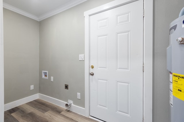 121 Kerr Ave, Lufkin, TX 75904 - laundry area with hookup for an electric dryer, dark wood-style floors, ornamental molding, washer hookup, and electric water heater