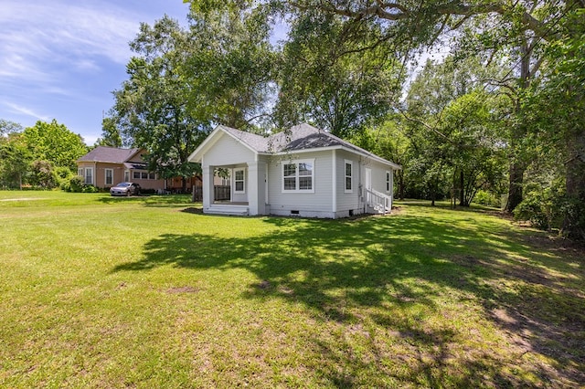 121 Kerr Ave, Lufkin, TX 75904 - rear view of house featuring crawl space and a lawn