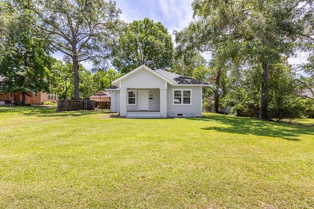 121 Kerr Ave, Lufkin, TX 75904 - back of house featuring crawl space, covered porch, and a shingled roof
