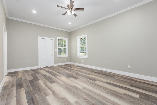 121 Kerr Ave, Lufkin, TX 75904 - unfurnished room with a ceiling fan, wood finished floors, recessed lighting, baseboards, and crown molding