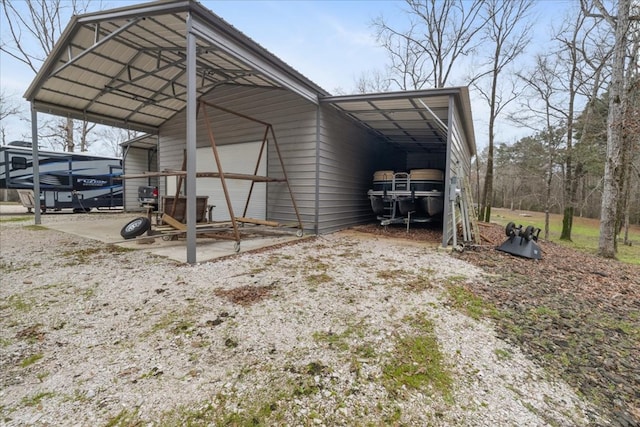 view of outdoor structure with a carport