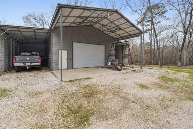 view of outbuilding featuring a garage