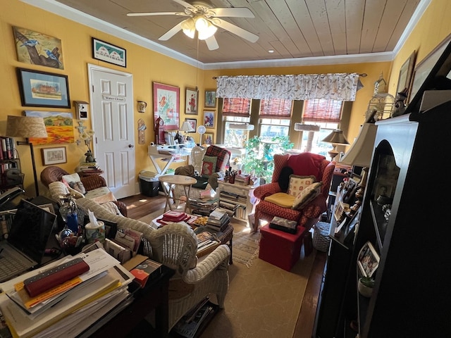 living room with wood ceiling, ceiling fan, and ornamental molding