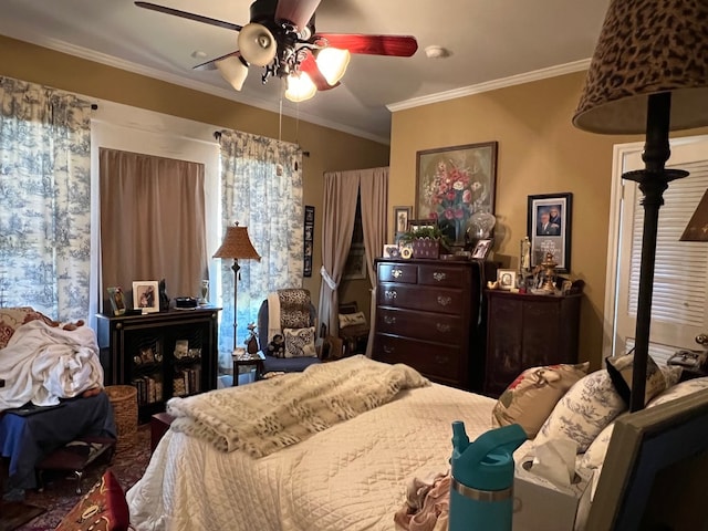 bedroom with ceiling fan and ornamental molding