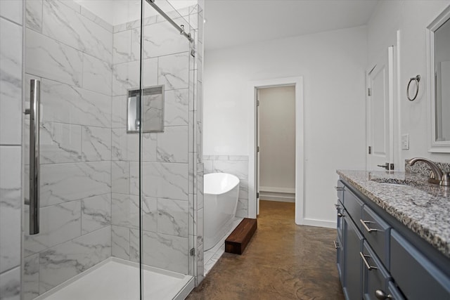 174 Cedar Hill Loop, Lufkin, TX 75904 - full bathroom with vanity, a freestanding tub, a stall shower, concrete flooring, and baseboards