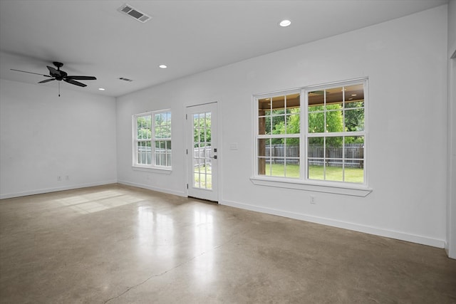 174 Cedar Hill Loop, Lufkin, TX 75904 - spare room with baseboards, concrete floors, a ceiling fan, and recessed lighting