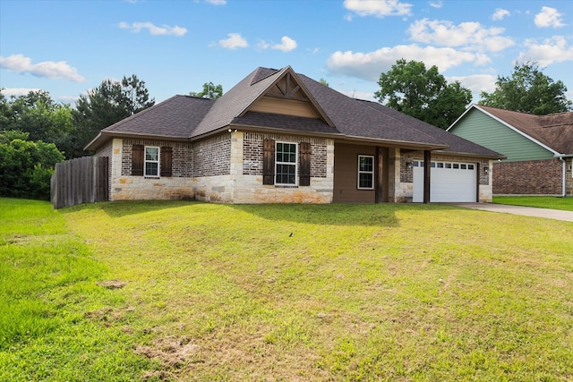 174 Cedar Hill Loop, Lufkin, TX 75904 - view of front of property with an attached garage, driveway, stone siding, and roof with shingles