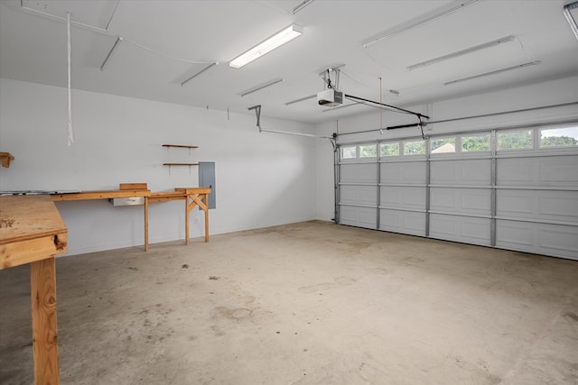 174 Cedar Hill Loop, Lufkin, TX 75904 - garage featuring a garage door opener and electric panel