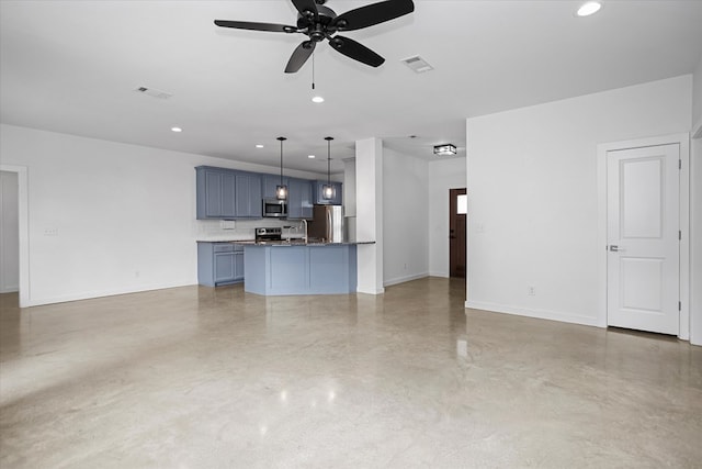 174 Cedar Hill Loop, Lufkin, TX 75904 - unfurnished living room featuring a ceiling fan, recessed lighting, finished concrete floors, and baseboards