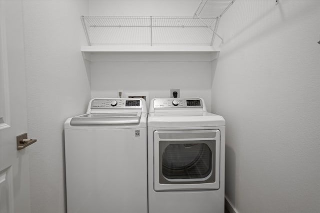 174 Cedar Hill Loop, Lufkin, TX 75904 - laundry room with washer and clothes dryer