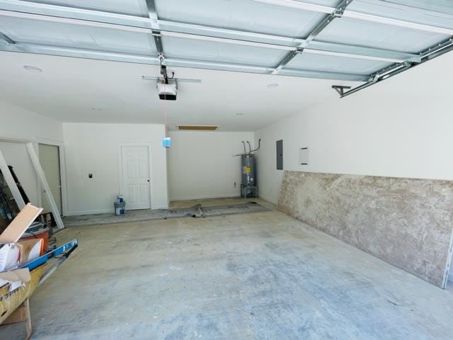 garage with secured water heater and electric panel