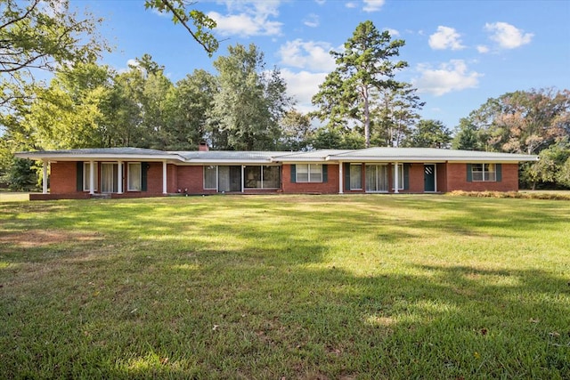 view of front of property with a front lawn