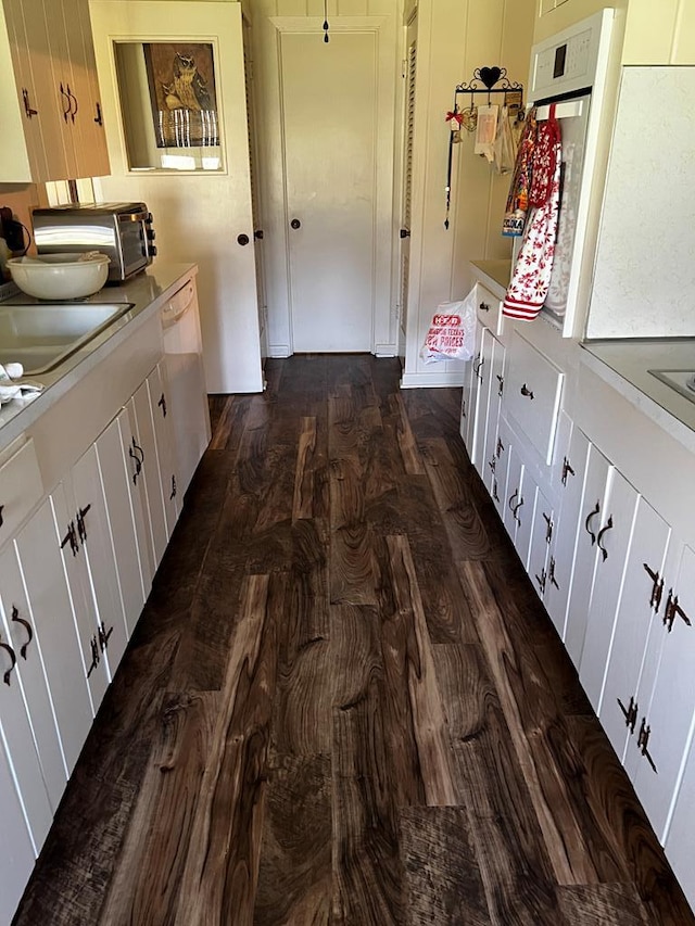 mudroom with dark hardwood / wood-style floors