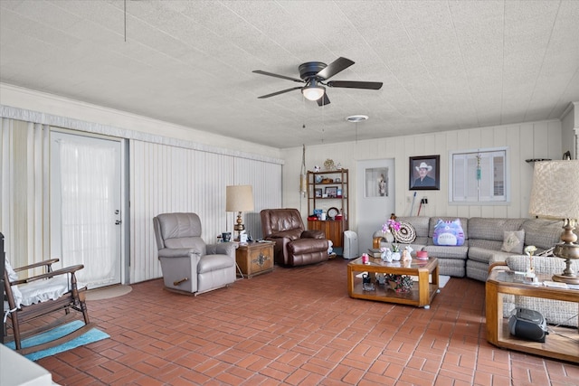 living room featuring ceiling fan