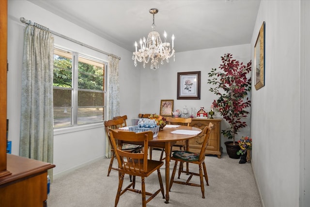 carpeted dining room with a notable chandelier