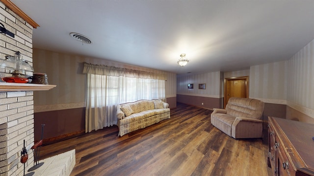 living room with dark hardwood / wood-style floors