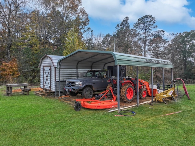 view of outbuilding with a carport and a yard