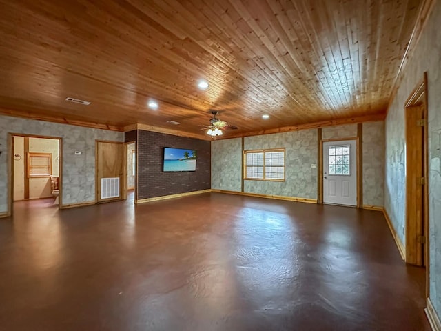 interior space with ceiling fan and wooden ceiling