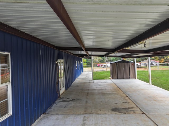 view of patio featuring a shed