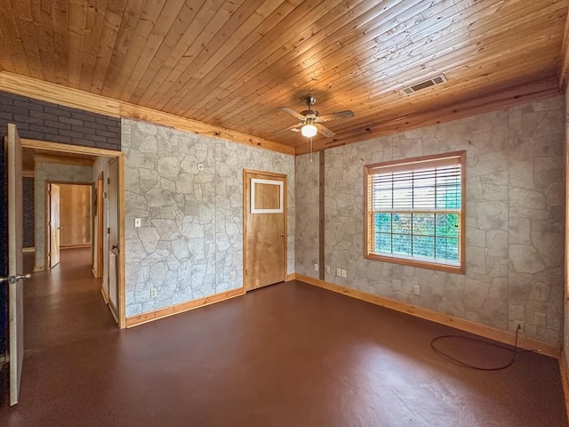 spare room with ceiling fan and wooden ceiling