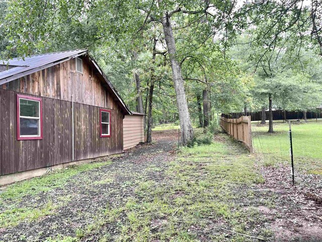 view of yard with a detached carport