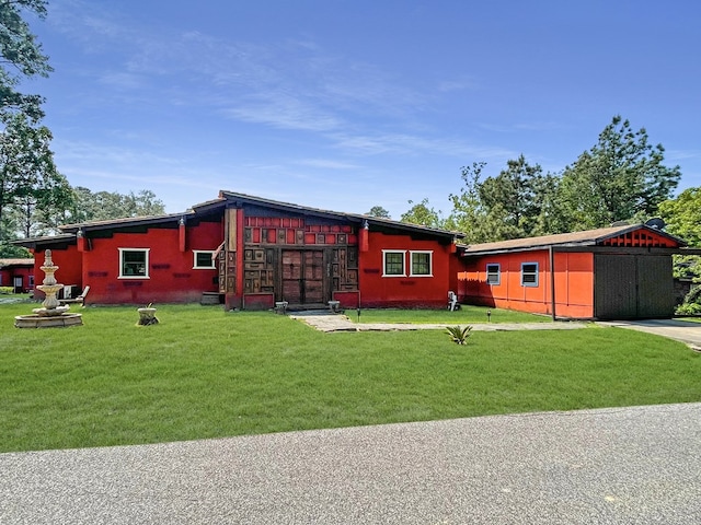 exterior space with a front yard