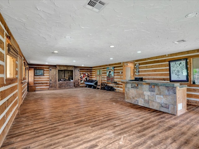 2104 Brentwood Dr, Lufkin, TX 75901 - unfurnished living room with wood finished floors, recessed lighting, and wooden walls