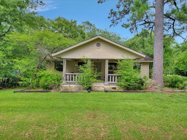 2104 Brentwood Dr, Lufkin, TX 75901 - view of front of home with a front yard and covered porch