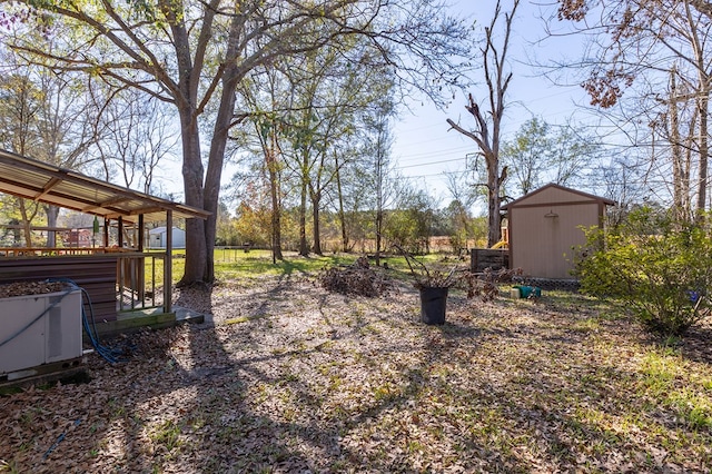 view of yard featuring ac unit and a shed