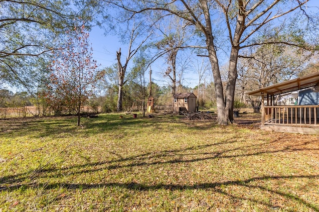 1407 Fairchild Dr, Diboll, TX 75941 - view of grassy yard with a shed
