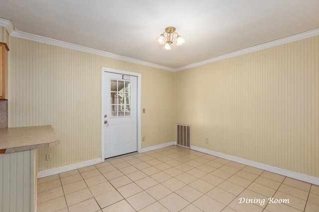 1407 Fairchild Dr, Diboll, TX 75941 - unfurnished dining area featuring crown molding and a chandelier