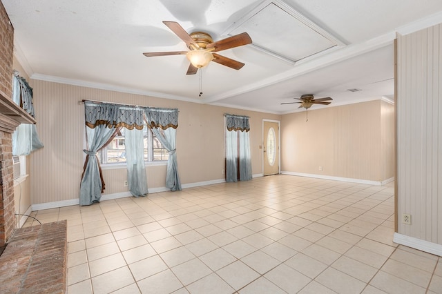 tiled empty room featuring ceiling fan and ornamental molding