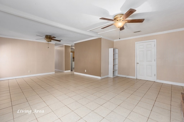 tiled empty room with ceiling fan and ornamental molding