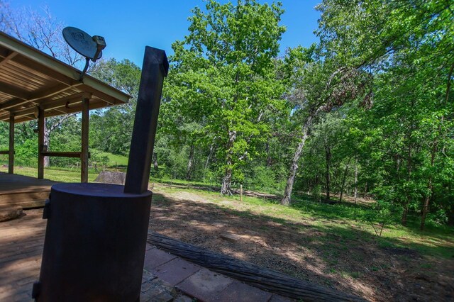 914 County Road 849, Cushing, TX 75760 - view of property location with a forest