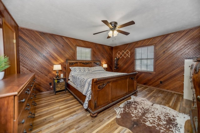 914 County Road 849, Cushing, TX 75760 - living area featuring wooden ceiling, light tile patterned floors, wooden walls, beam ceiling, and a wood stove