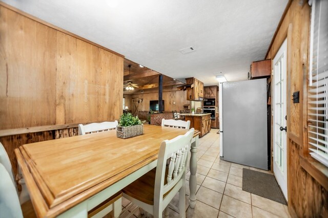 914 County Road 849, Cushing, TX 75760 - full bathroom with a shower stall, vanity, and wooden walls