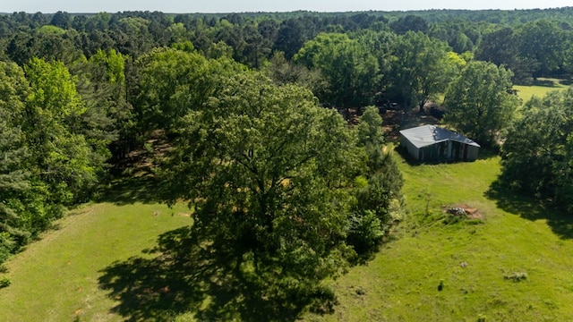 914 County Road 849, Cushing, TX 75760 - view of green lawn featuring an outdoor structure