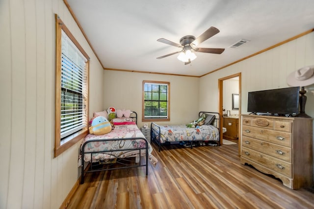 914 County Road 849, Cushing, TX 75760 - kitchen with stainless steel appliances, a sink, brown cabinetry, decorative backsplash, and light tile patterned flooring