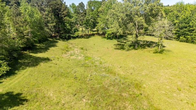 914 County Road 849, Cushing, TX 75760 - view of outbuilding featuring an outdoor structure and a view of trees